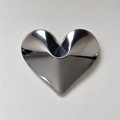Amore Wall Sculpture — mirror-finish stainless steel heart wall decor by AERIS LIVING