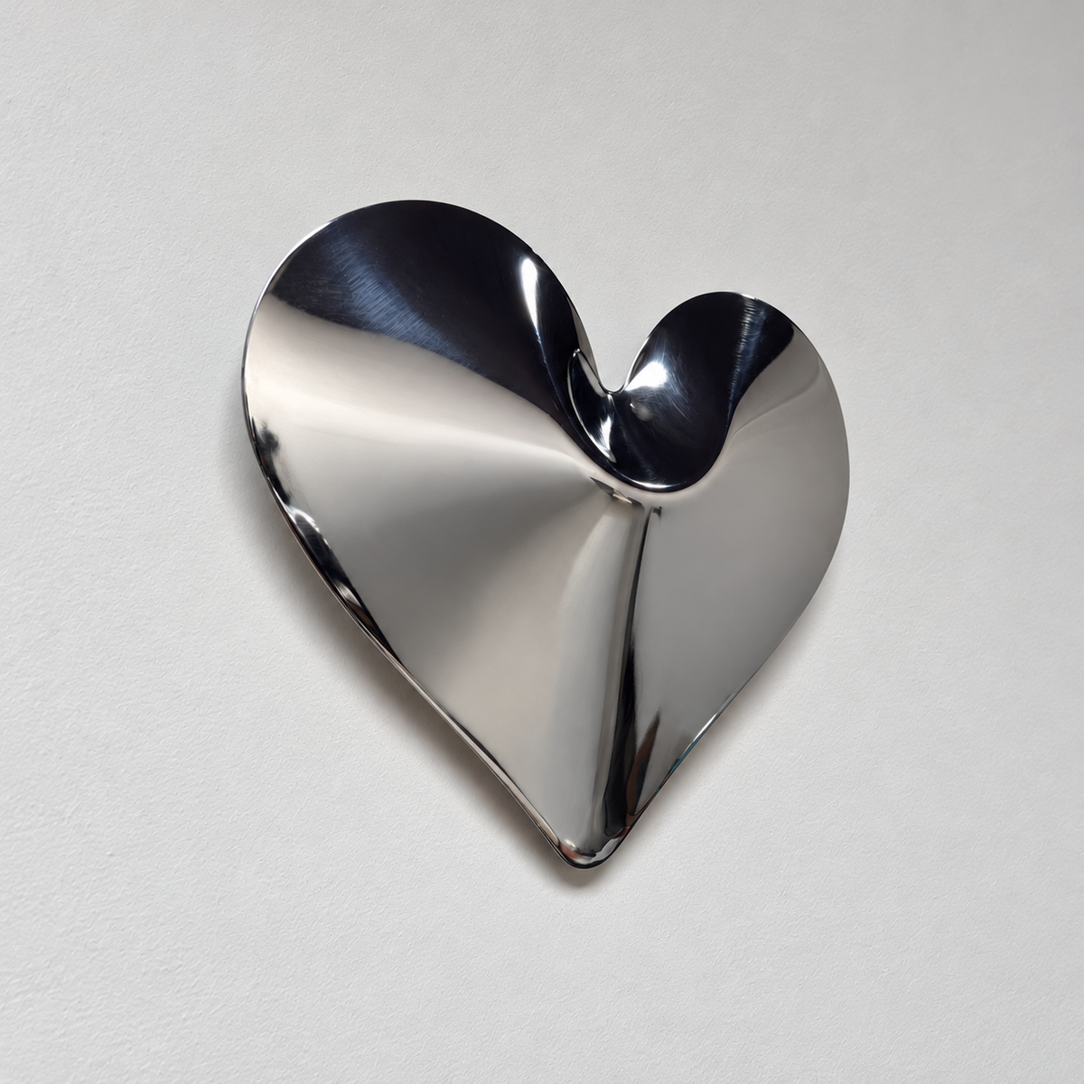 Amore Wall Sculpture — mirror-finish stainless steel heart wall decor by AERIS LIVING (view 3)