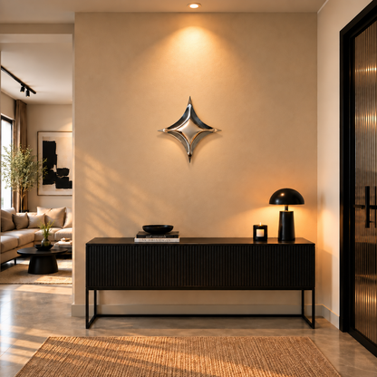 Astra Wall Sculpture — mirror-finish stainless steel four-point star wall decor by AERIS LIVING (view 2)