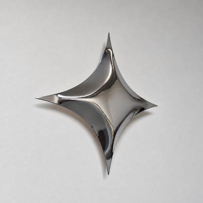 Astra Wall Sculpture — mirror-finish stainless steel four-point star wall decor by AERIS LIVING (view 3)
