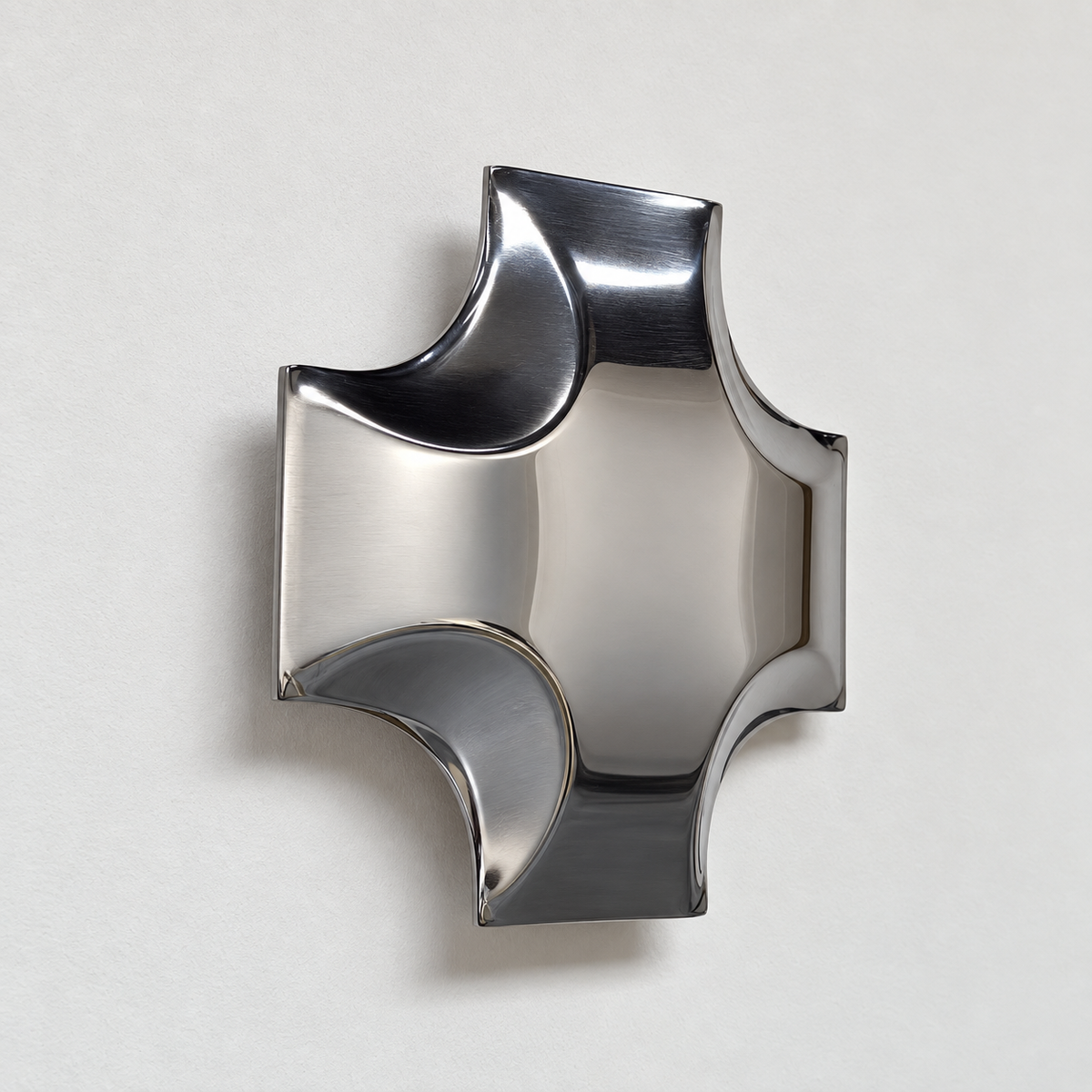 Quadra Wall Sculpture — mirror-finish stainless steel quatrefoil cross wall decor by AERIS LIVING (view 4)